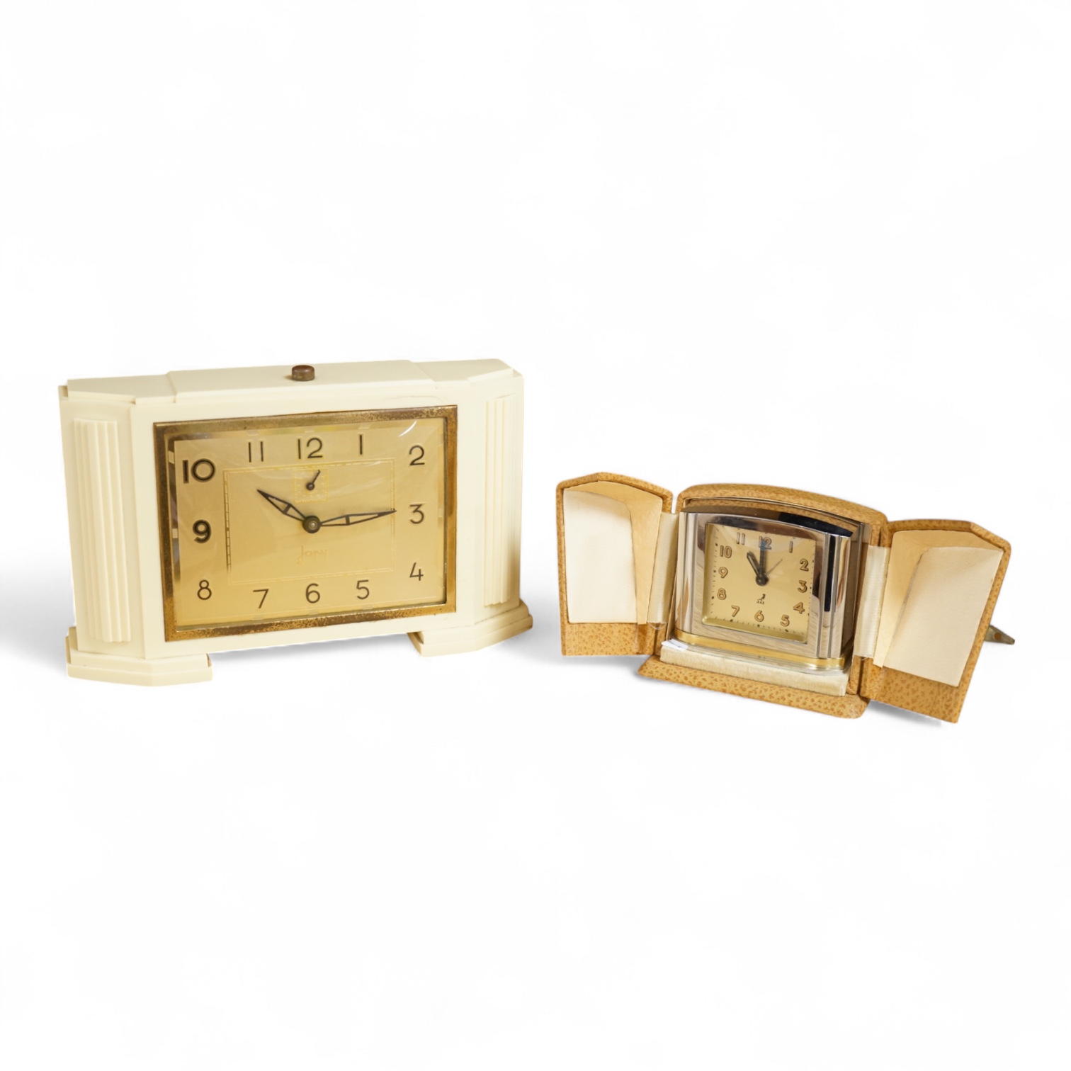 Two Art Deco timepieces comprising a Japy alarm clock and a Jas cased travelling example, largest 22cm wide